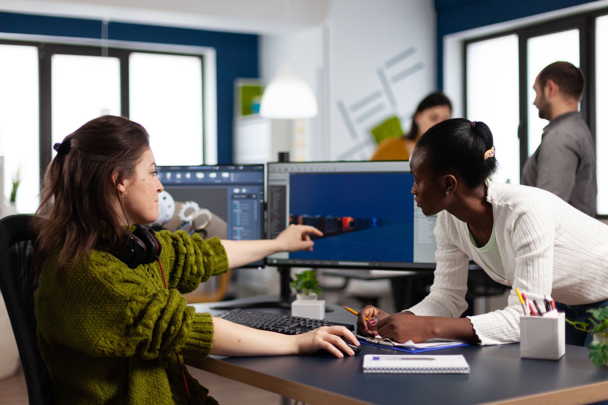 diverse women game developers creating game interface