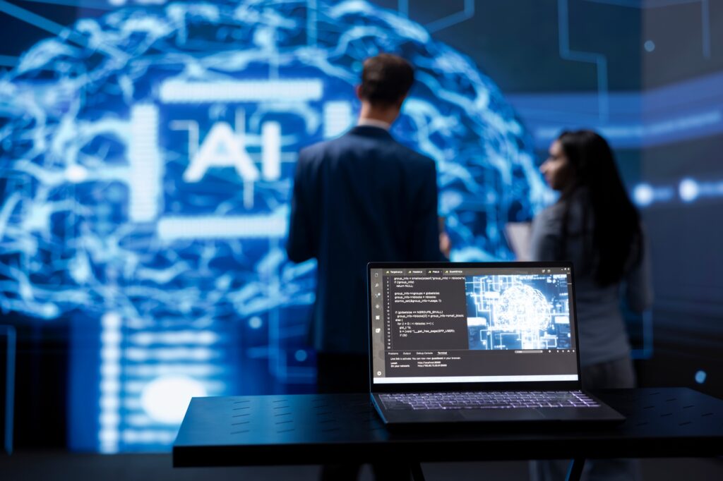 focus on laptop running ai cognitive computing tech used by it staff members