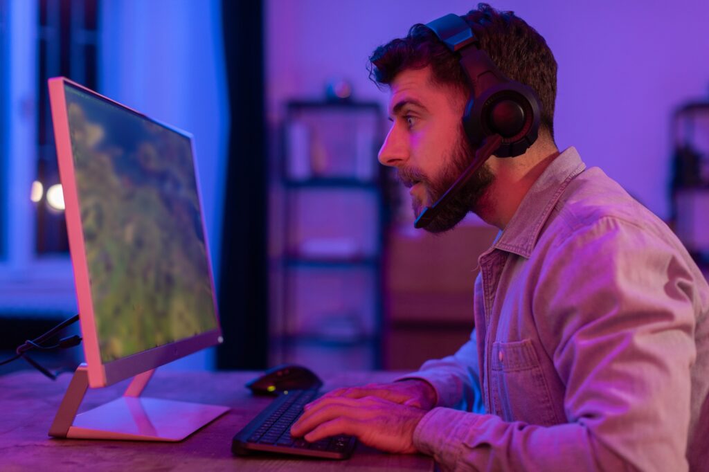 gamer at computer playing a first person game